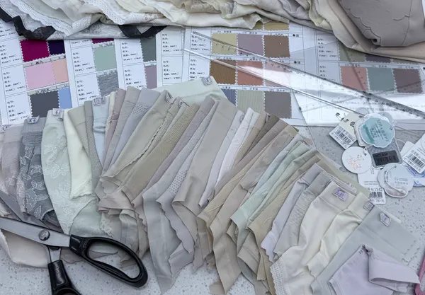 OEM underwear custom design process with fabric swatches and sample development