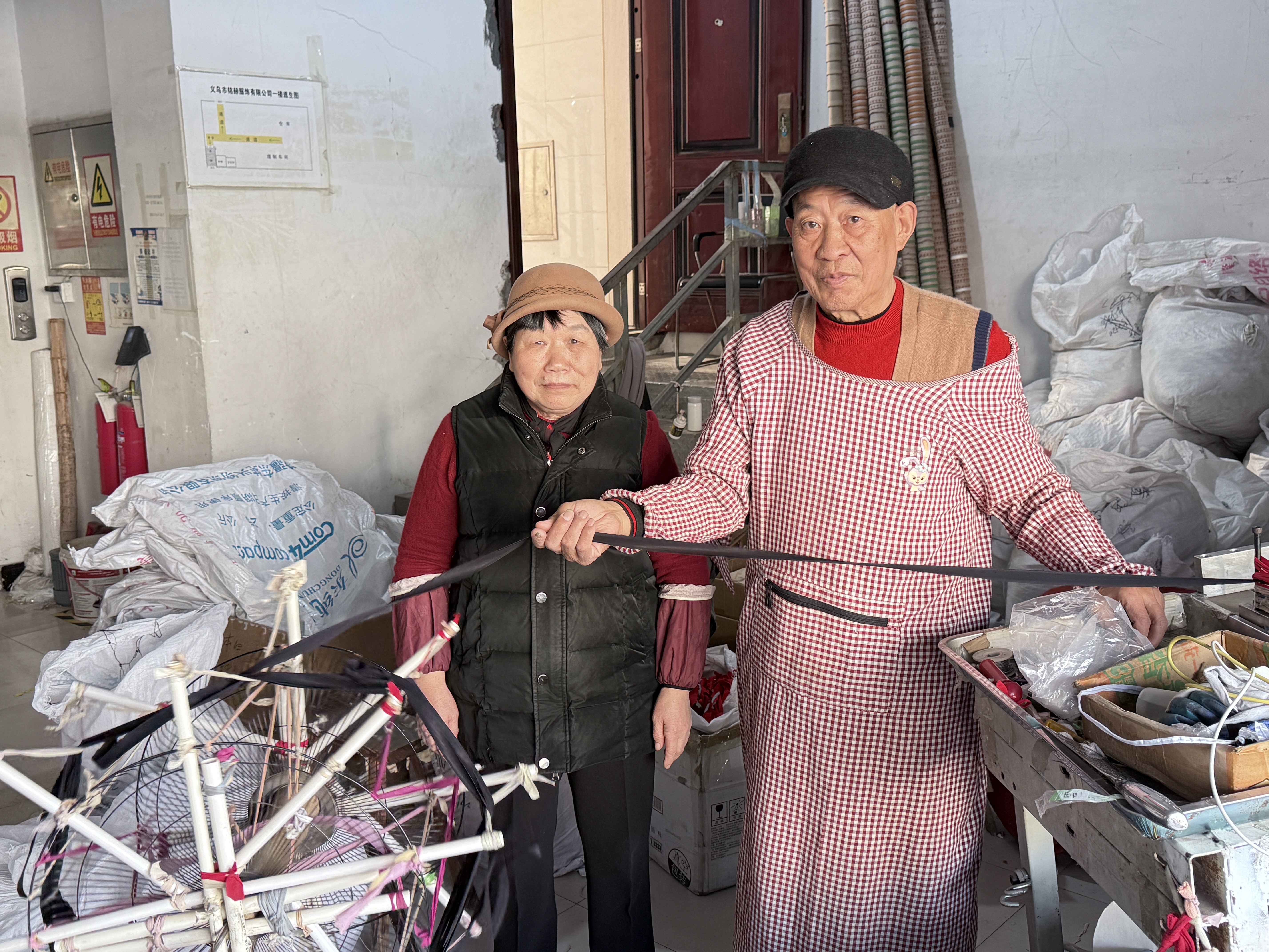 Mrs. Ye, founder of Yejie Underwear, working in the early family underwear production workshop in Yiwu, China